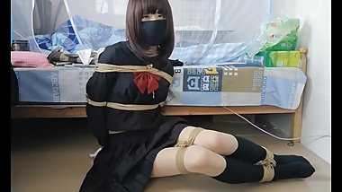 japanese tying herself up
