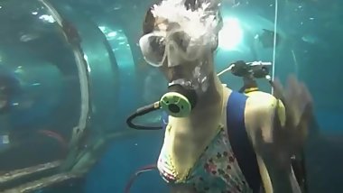 Japanese scuba girl at undersea world